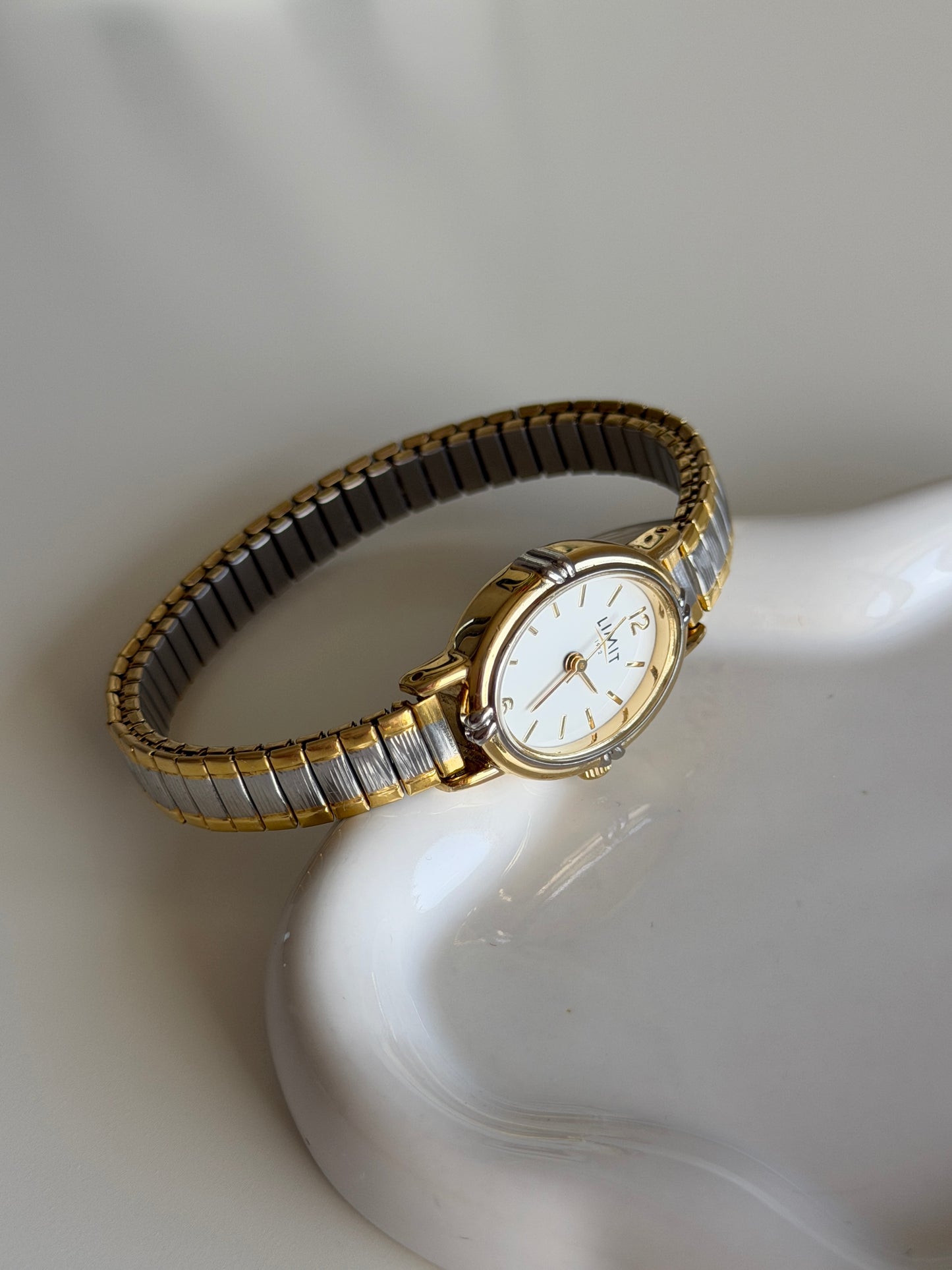 Lovely two-tone Limit watch with engraving on the case back
