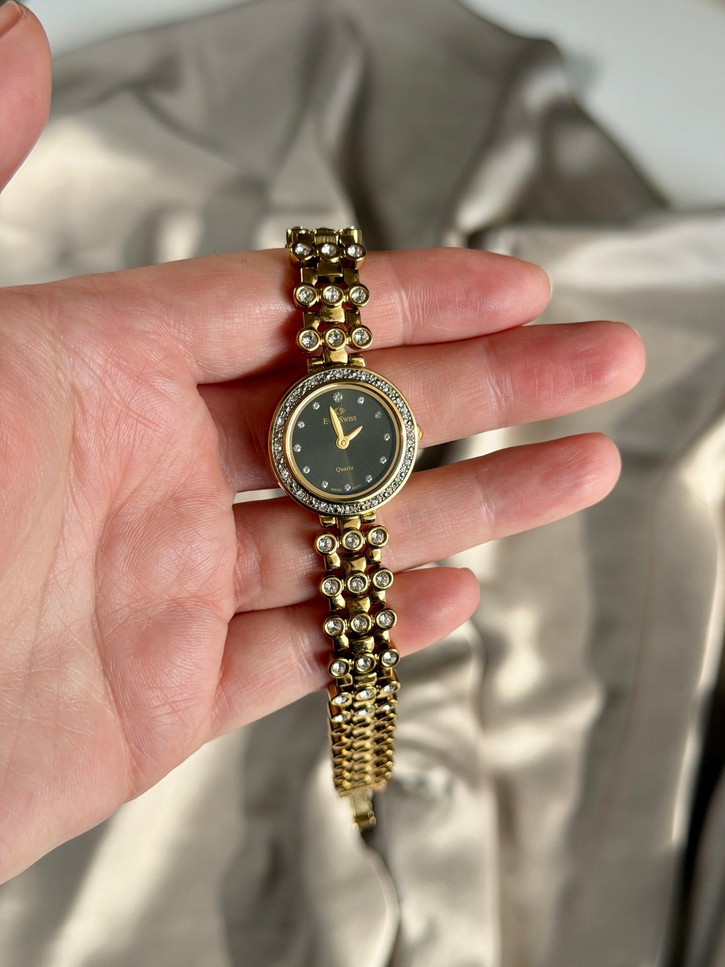 Elegant vintage gold-tone watch EverSwiss with black dial