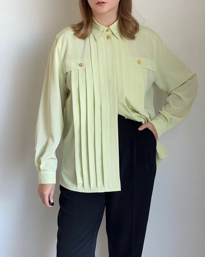 Beautiful vintage blouse in a pastel light green colour