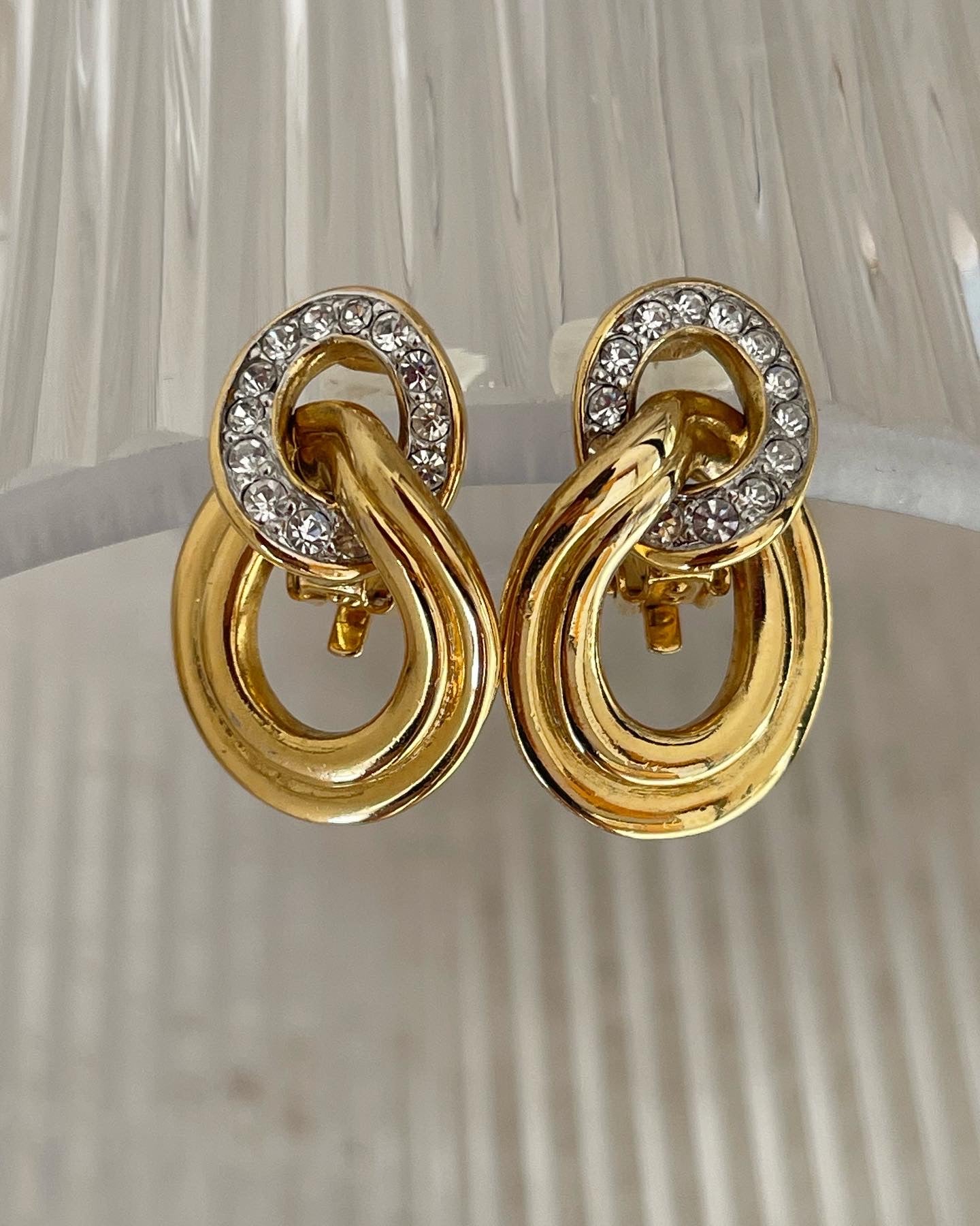 Beautiful and elegant vintage gold tone clip-on earrings with rhinestones