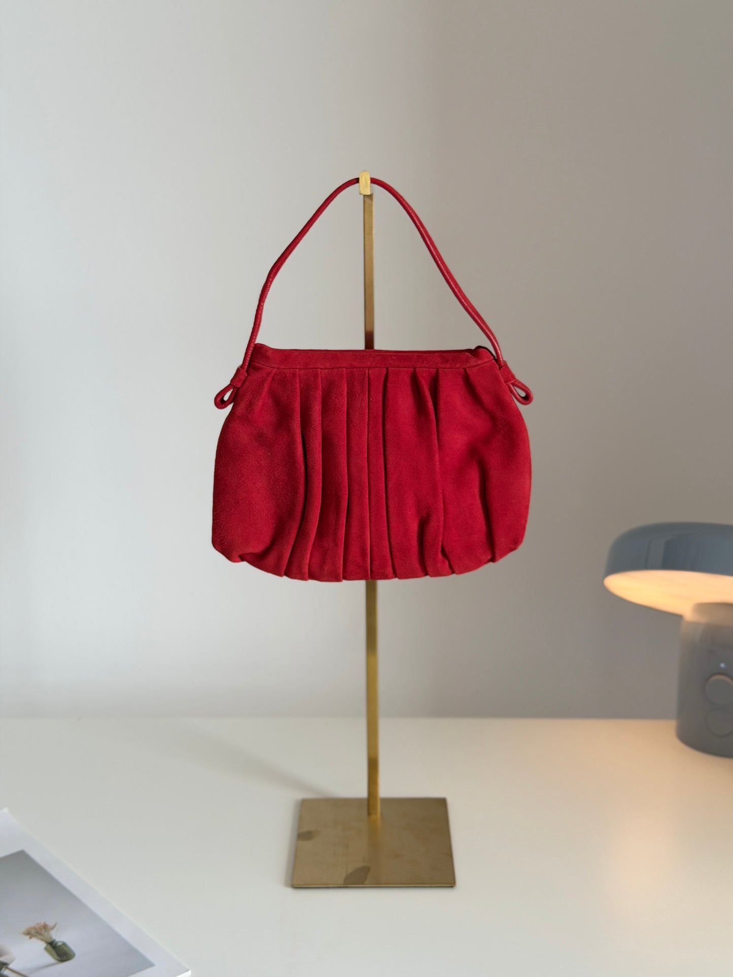 Vibrant red bag crafted from soft suede by Hobbs