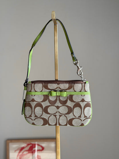Vintage Coach wristlet with lime green bow