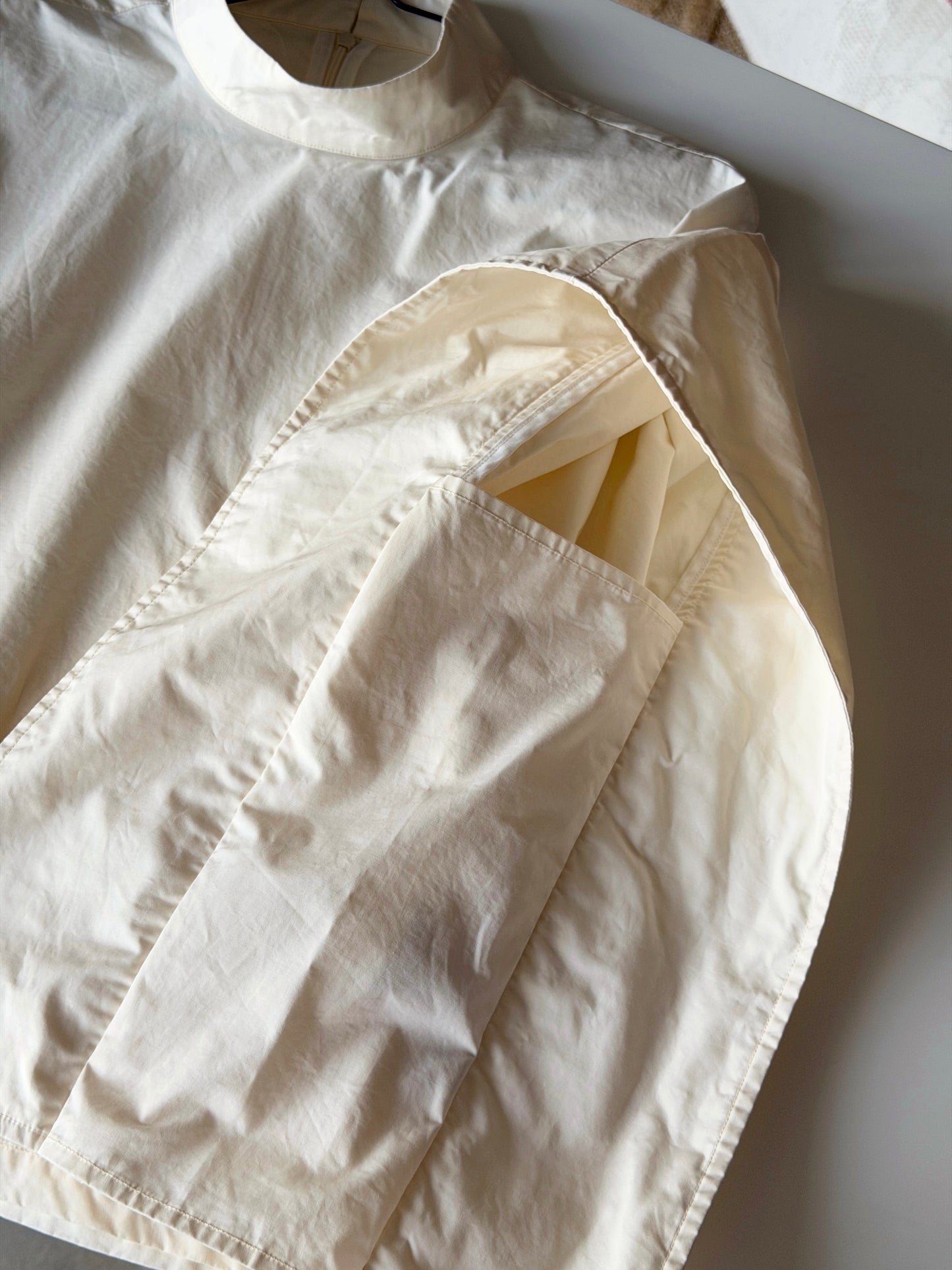 Minimalist cotton top in a soft cream shade