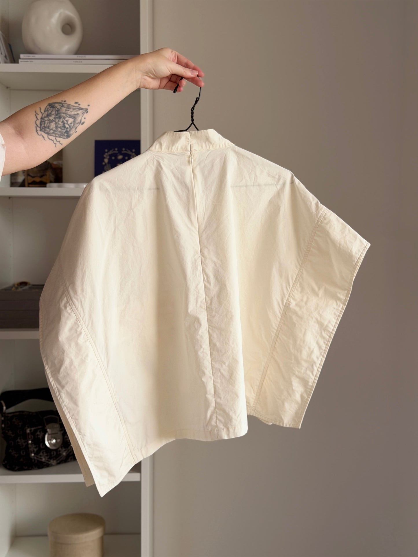 Minimalist cotton top in a soft cream shade