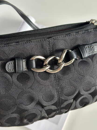 Timeless vintage authentic Coach wristlet bag