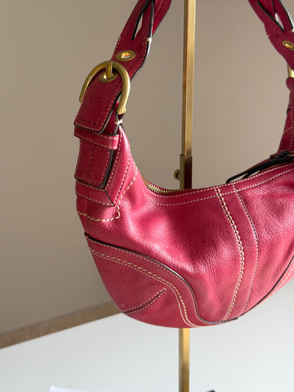 Iconic vintage Coach Soho bag in vibrant fuchsia leather