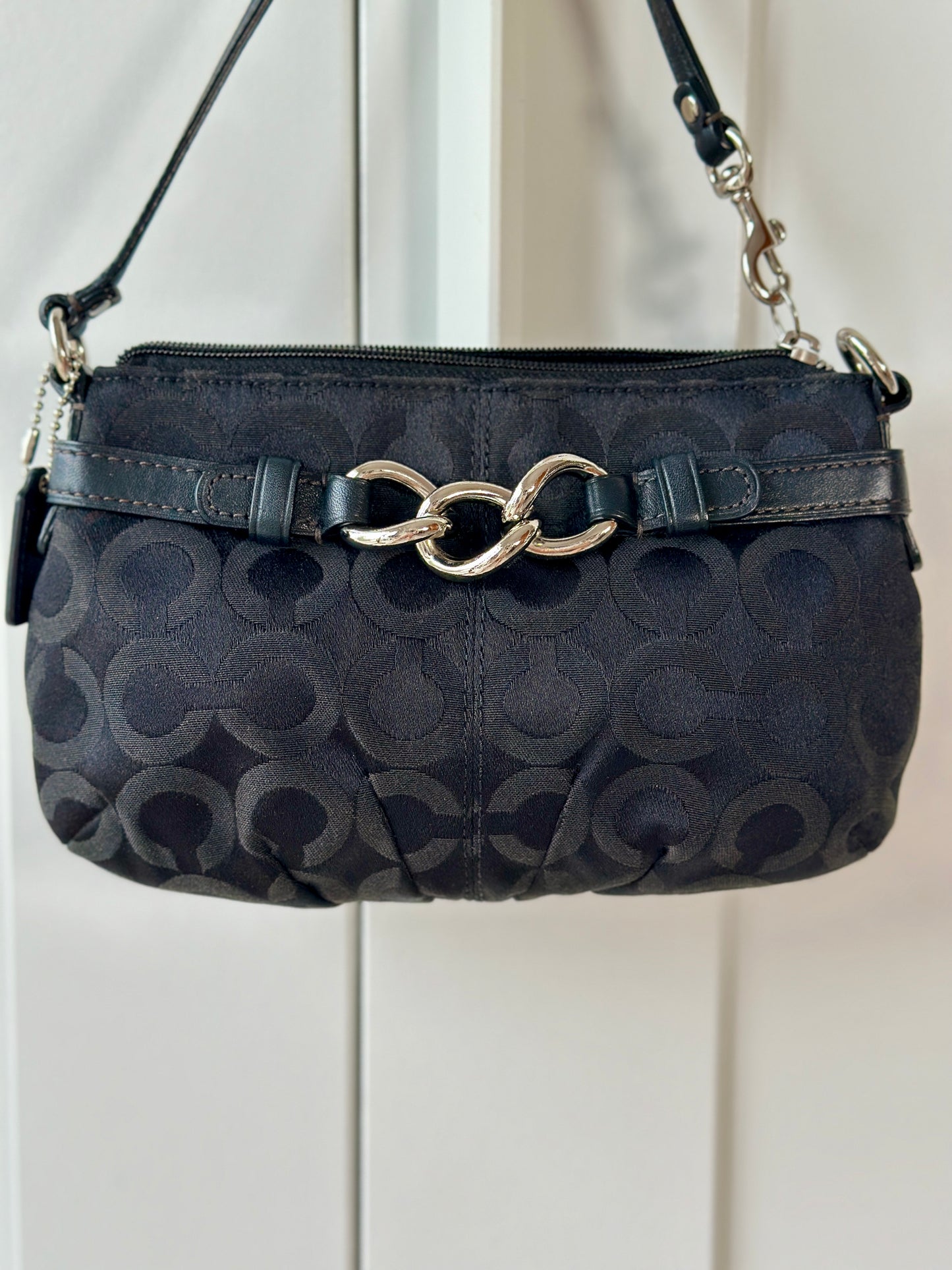 Timeless vintage authentic Coach wristlet bag