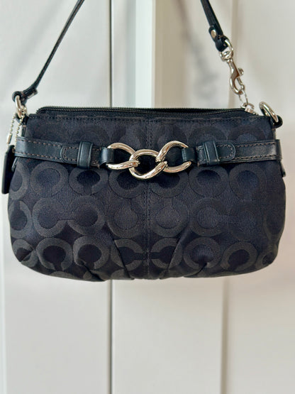 Timeless vintage authentic Coach wristlet bag