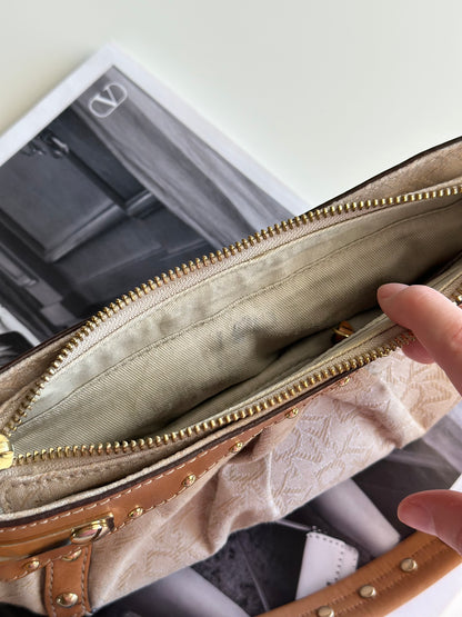 Vintage chic DKNY small bag with edgy details
