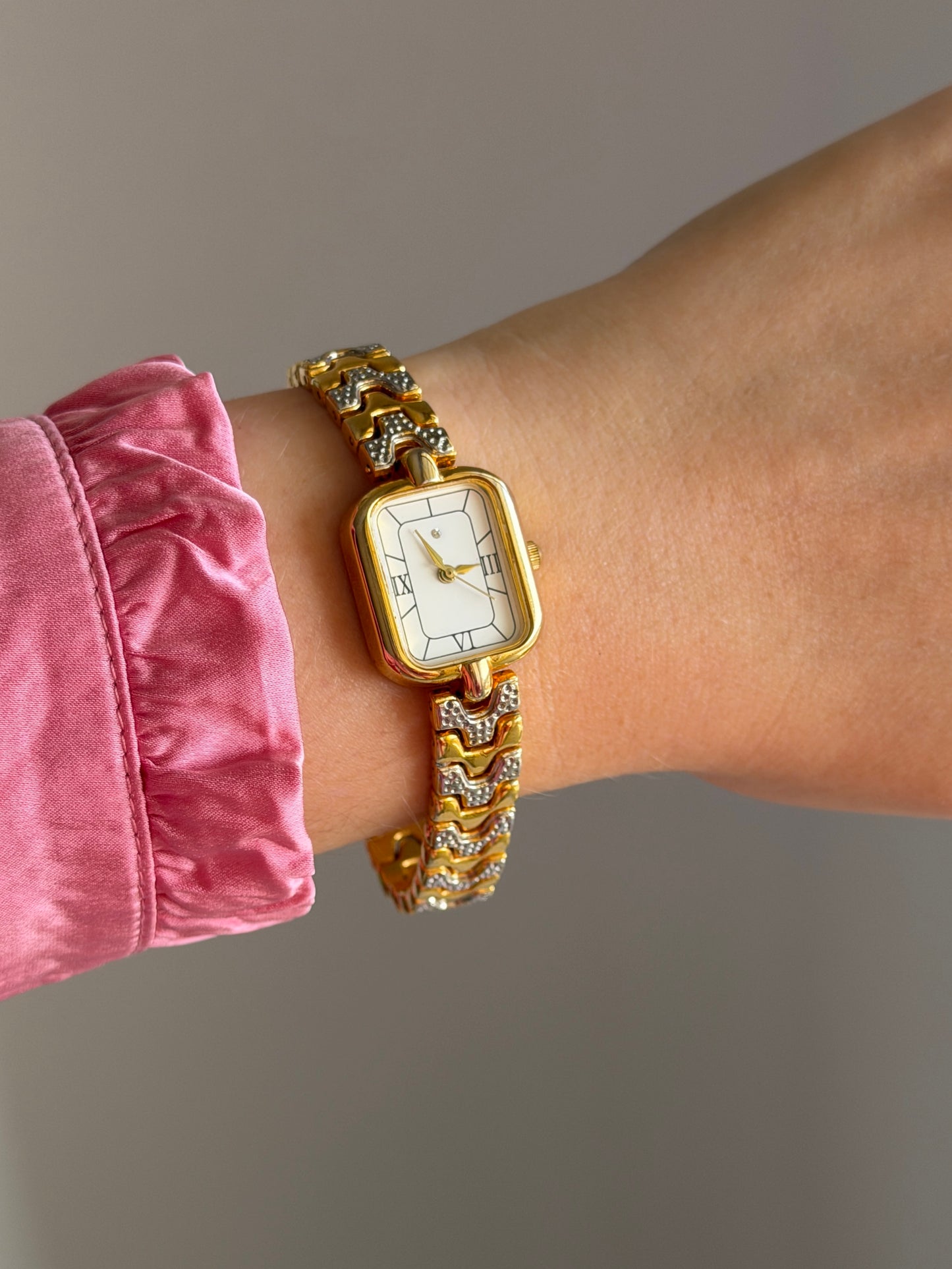 Elegant vintage watch with two-tone finish
