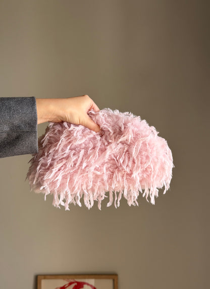 Playful pink clutch bag