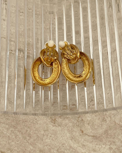 Beautiful and elegant vintage gold tone clip-on earrings with rhinestones