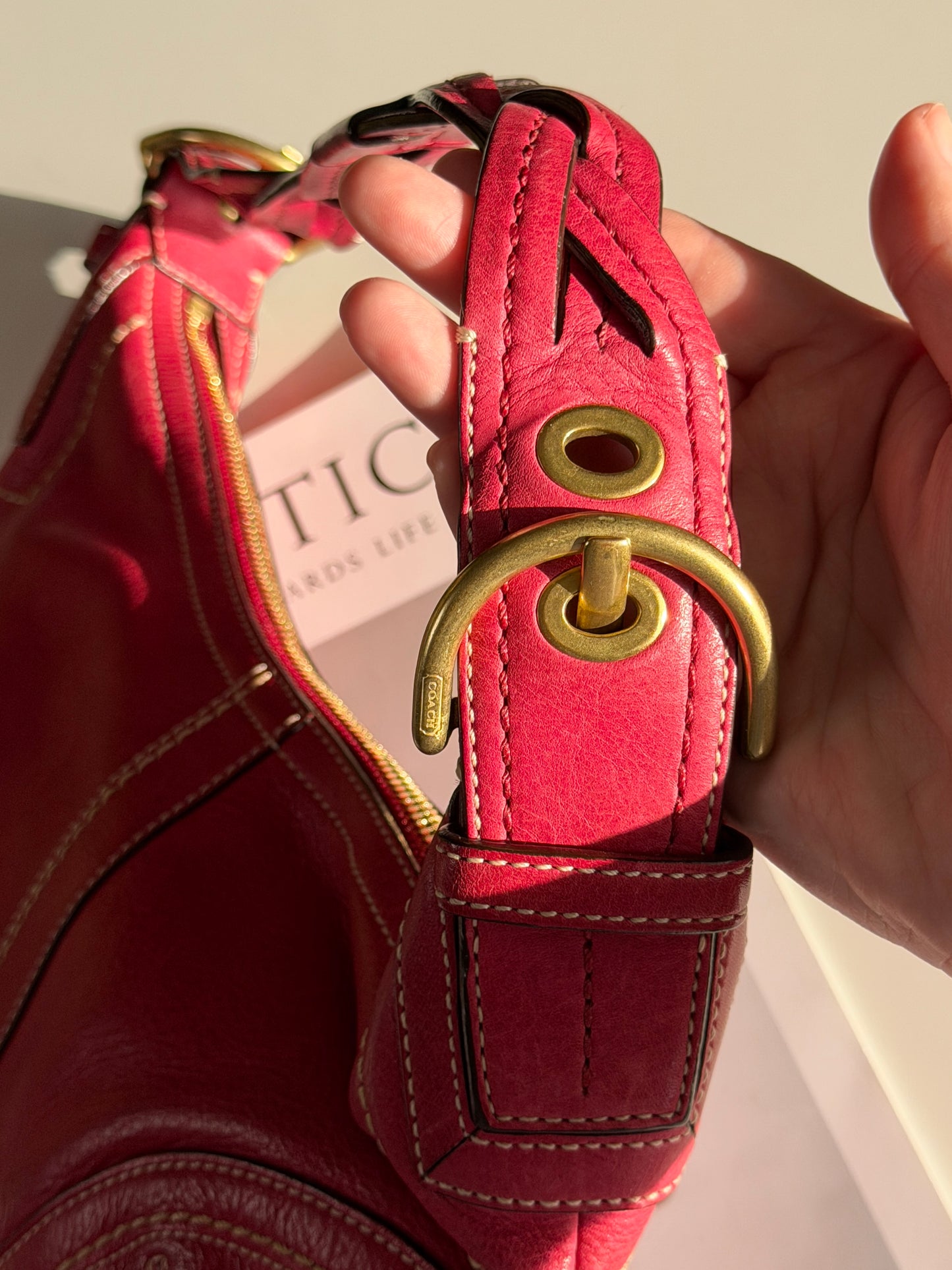 Iconic vintage Coach Soho bag in vibrant fuchsia leather