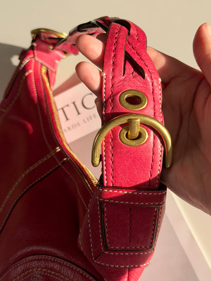 Iconic vintage Coach Soho bag in vibrant fuchsia leather