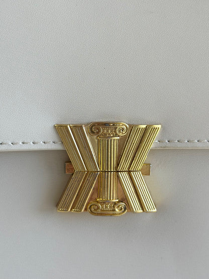 Elegant ivory leather handbag from Kassandre