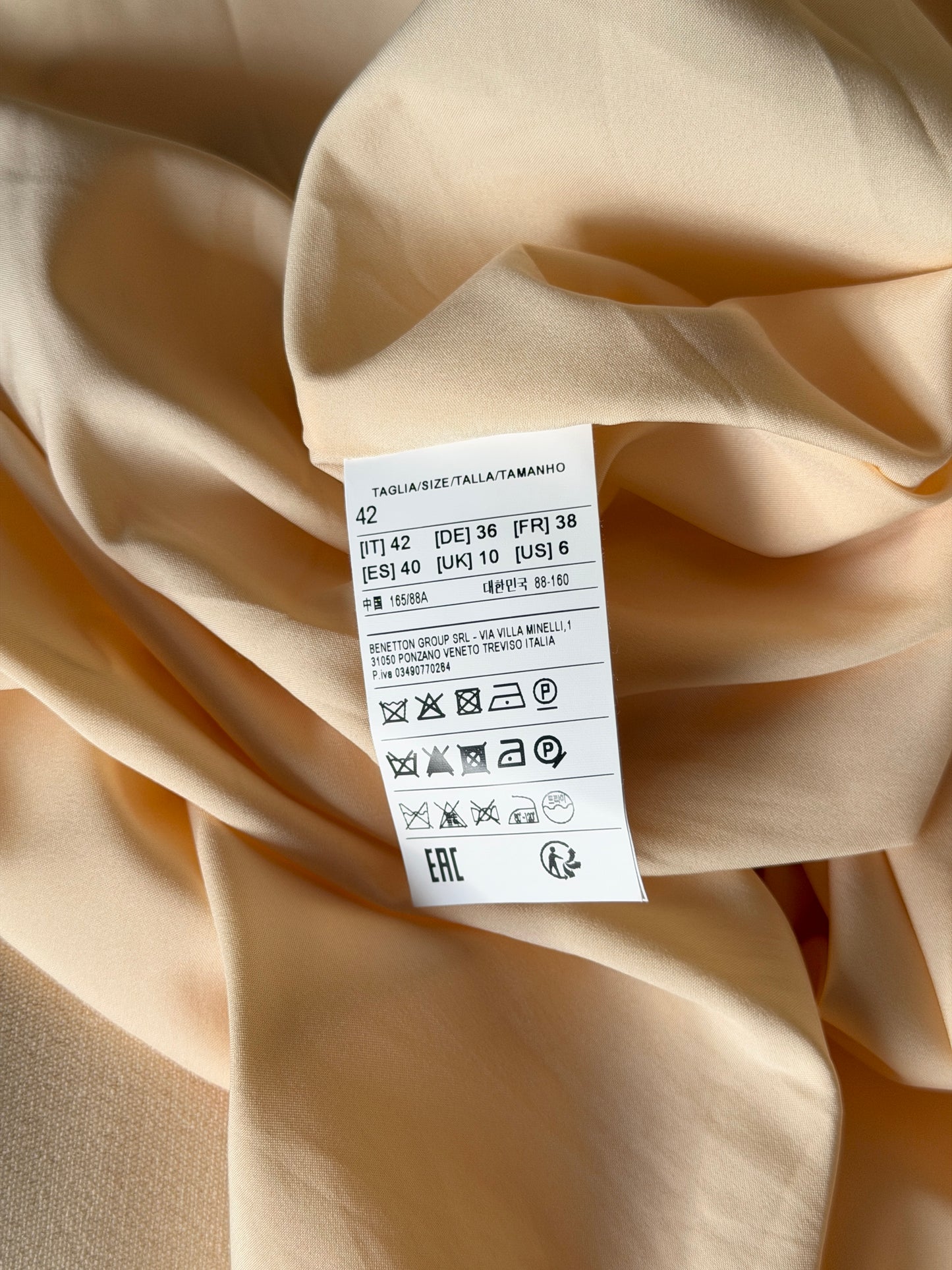 Stylish pale yellow long trench coat