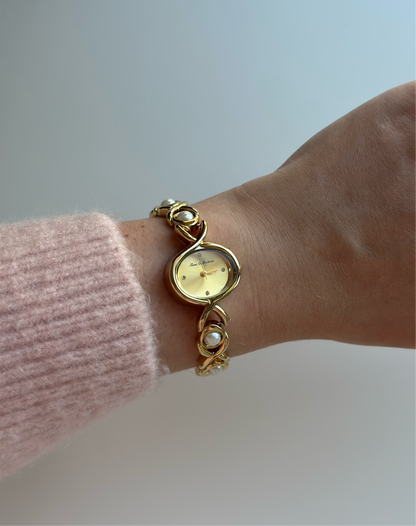 Charming vintage gold-tone watch with pearls