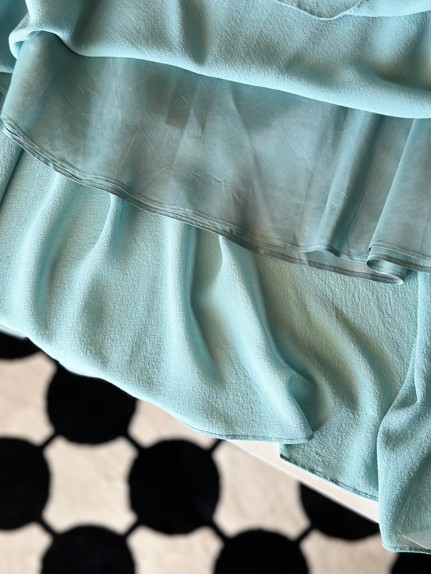Asymmetrical silk turquoise skirt by Pearce Fionda brand