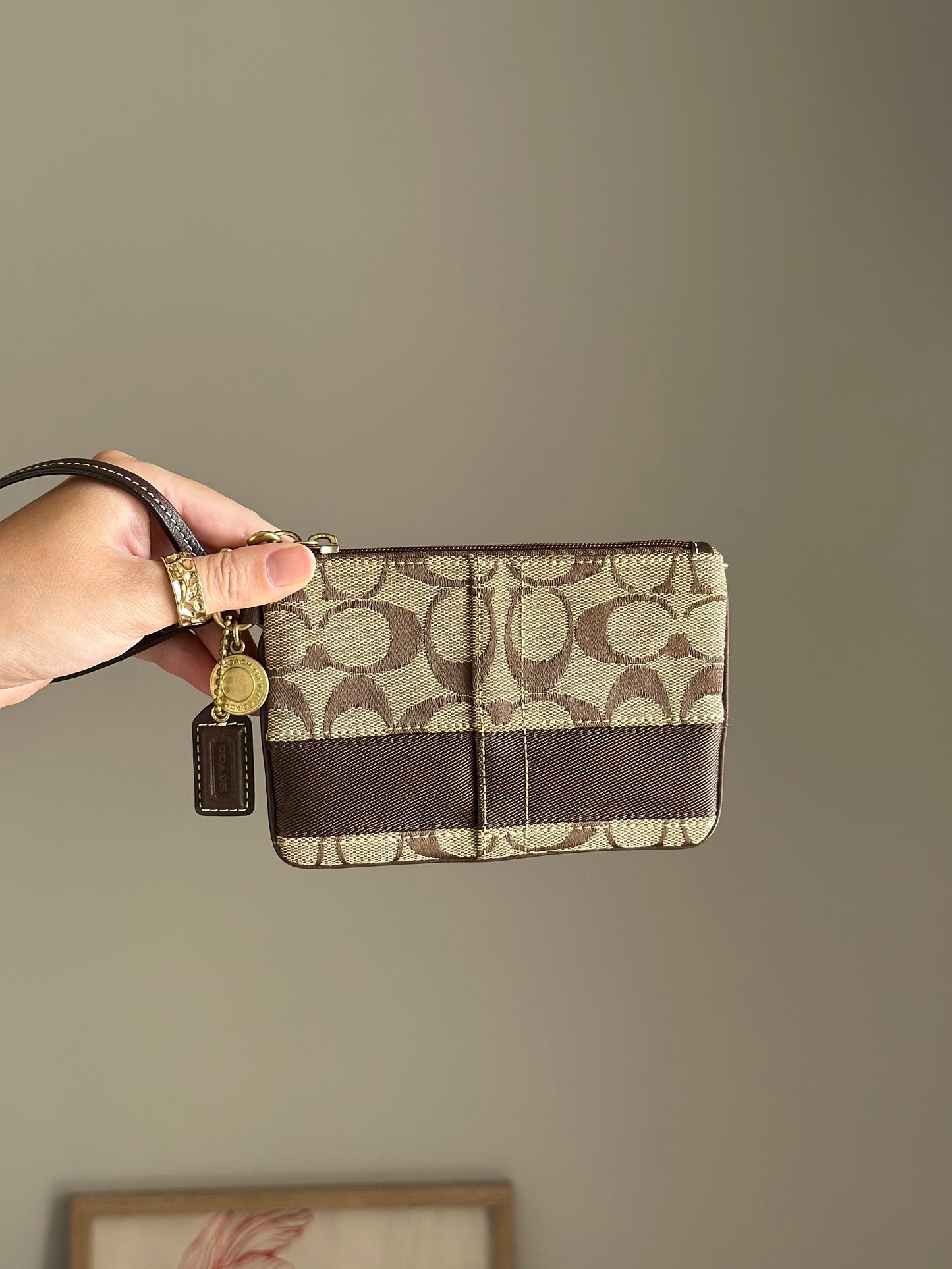 Iconic vintage brown Coach wristlet