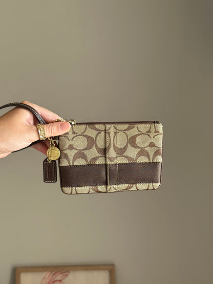 Iconic vintage brown Coach wristlet