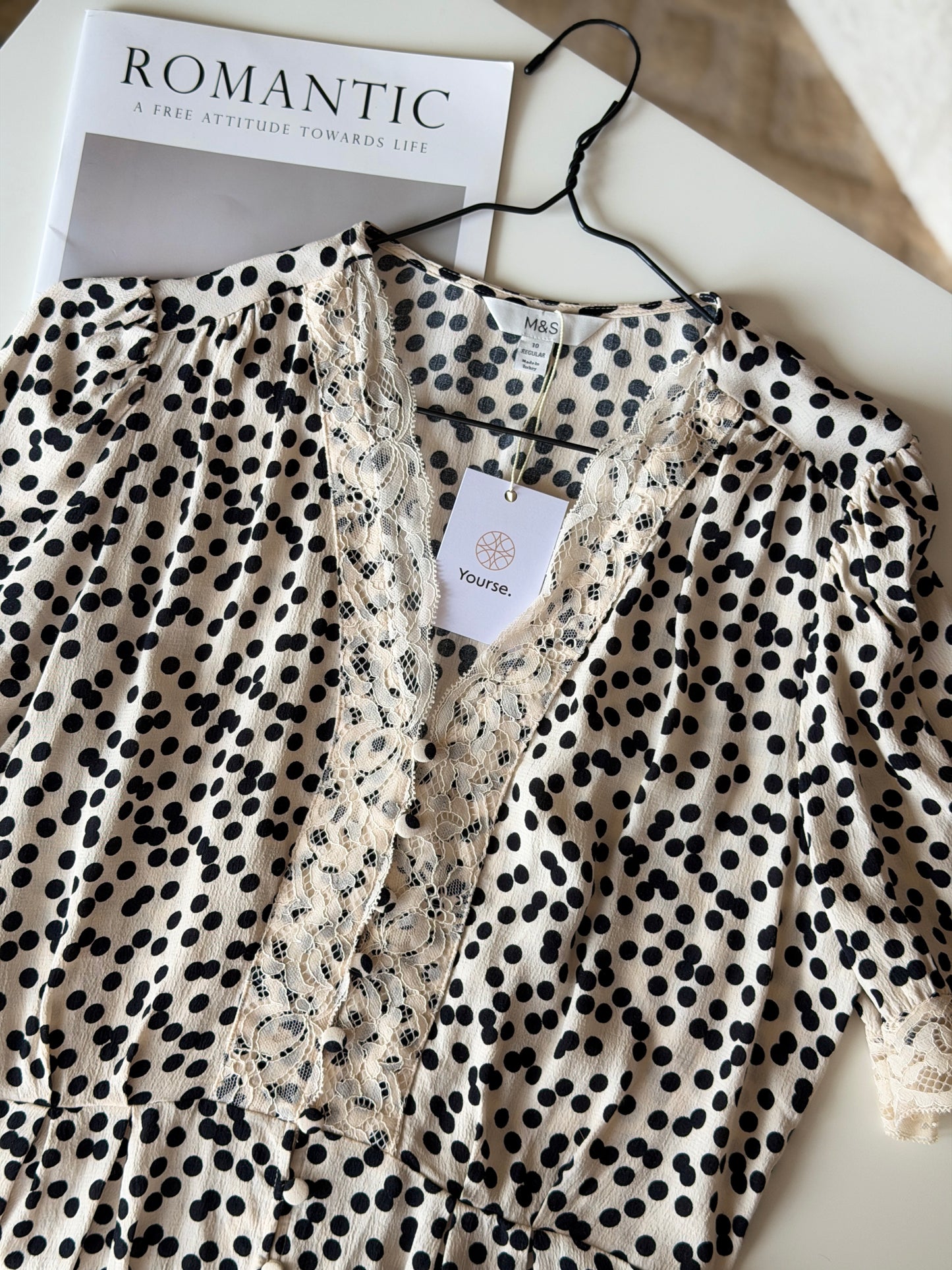 Polka dot blouse with lace