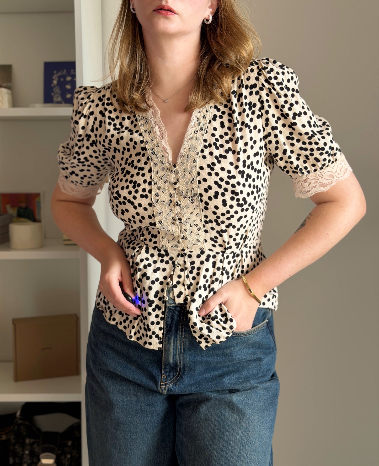 Polka dot blouse with lace