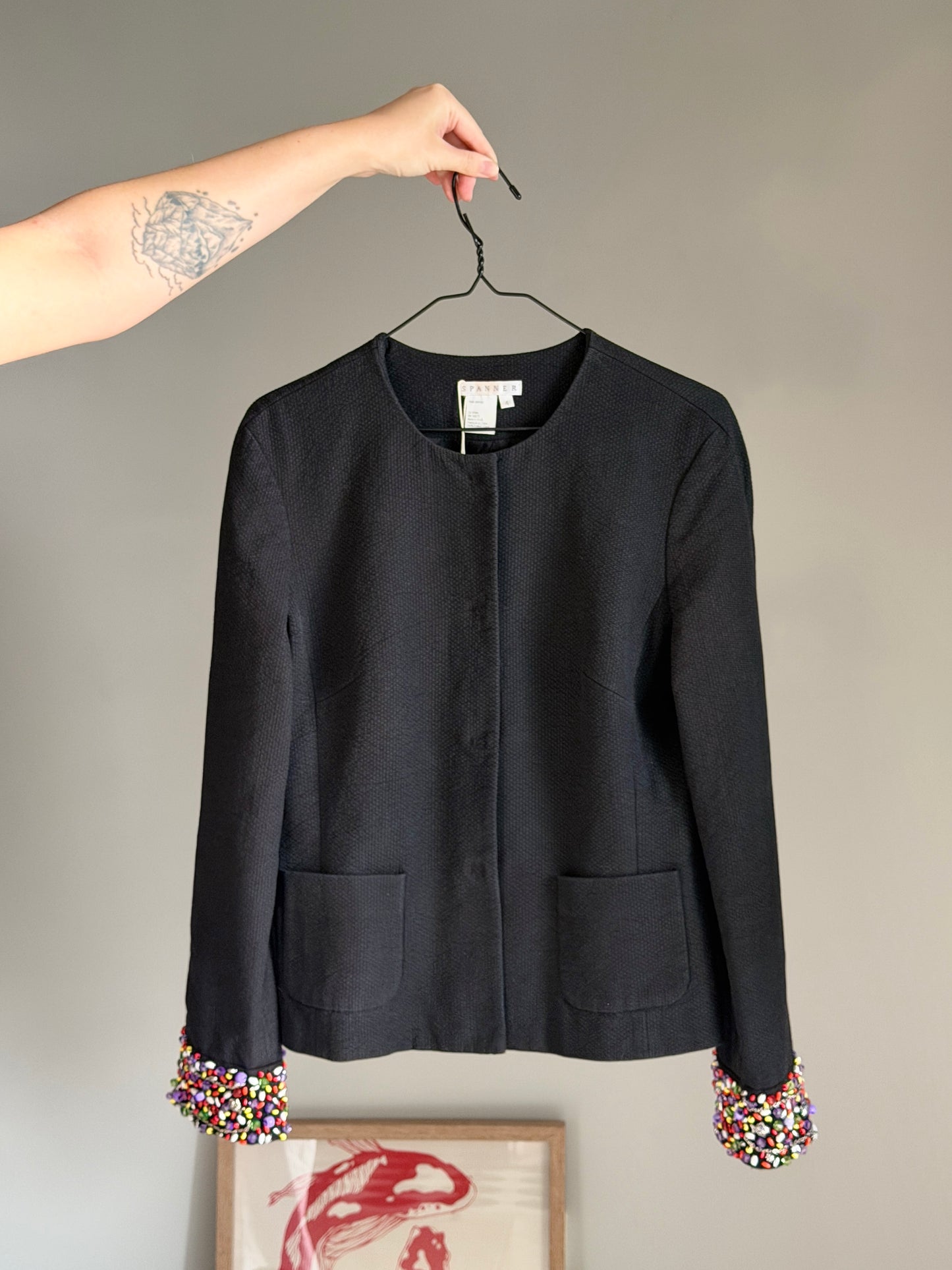 Chic vintage black blazer with embellished cuffs