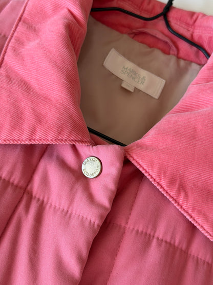 Charming quilted jacket in a soft coral pink shade
