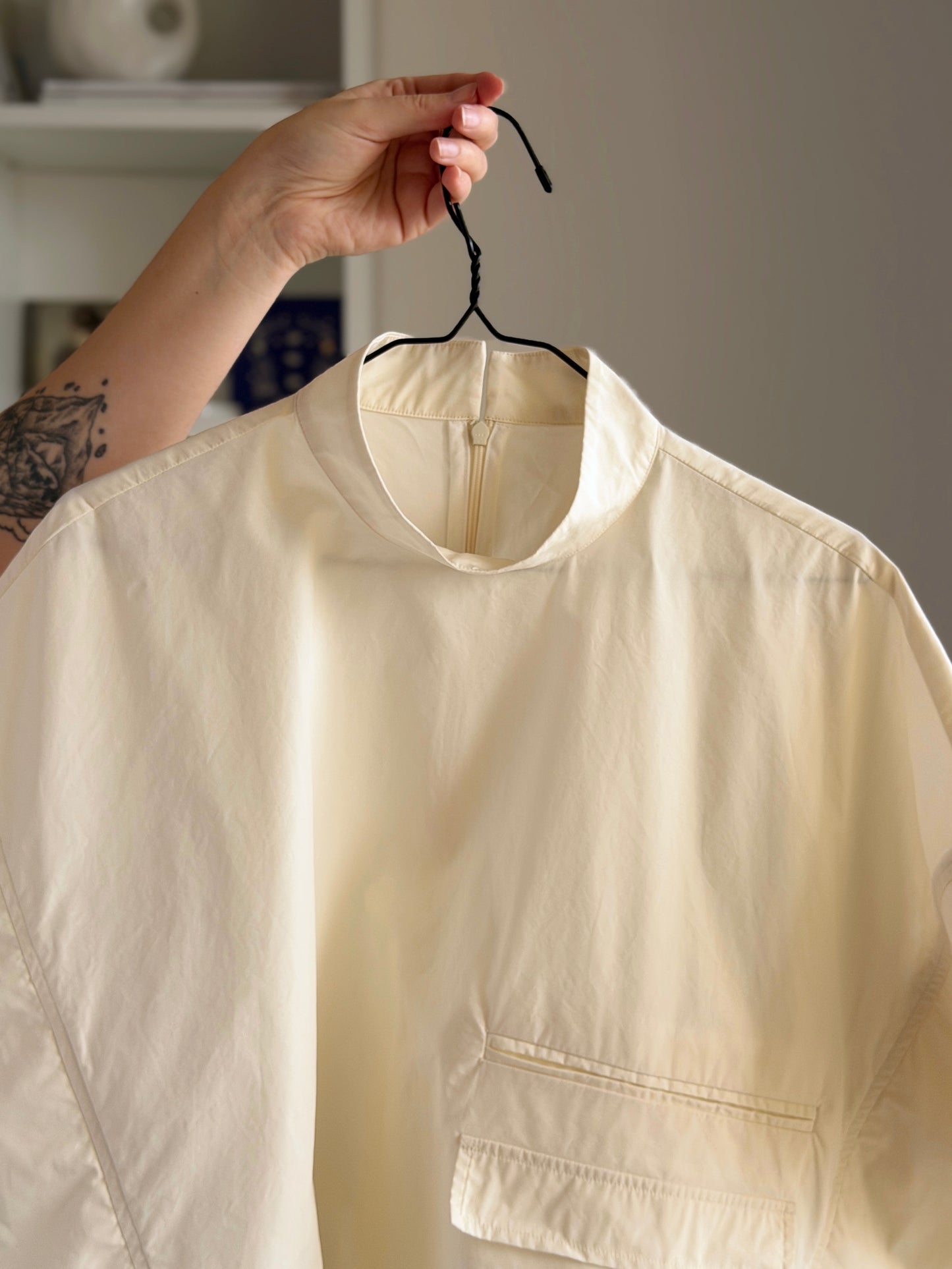 Minimalist cotton top in a soft cream shade