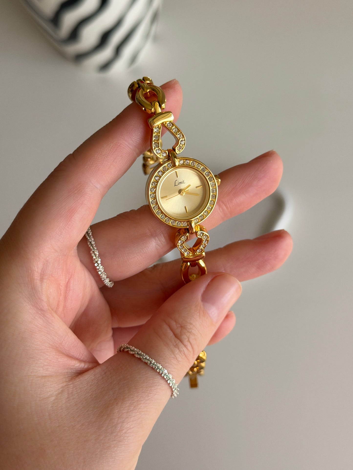 Amazing gold-tone watch Limit with rhinestones