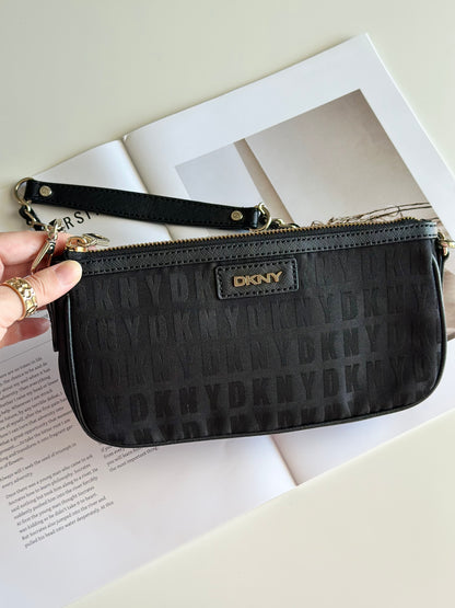 Stunning pre-loved black DKNY baguette bag