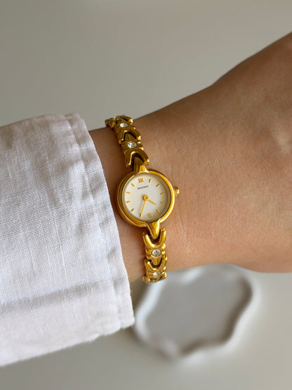 Vintage Sekonda gold-tone watch with crystals