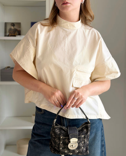 Minimalist cotton top in a soft cream shade