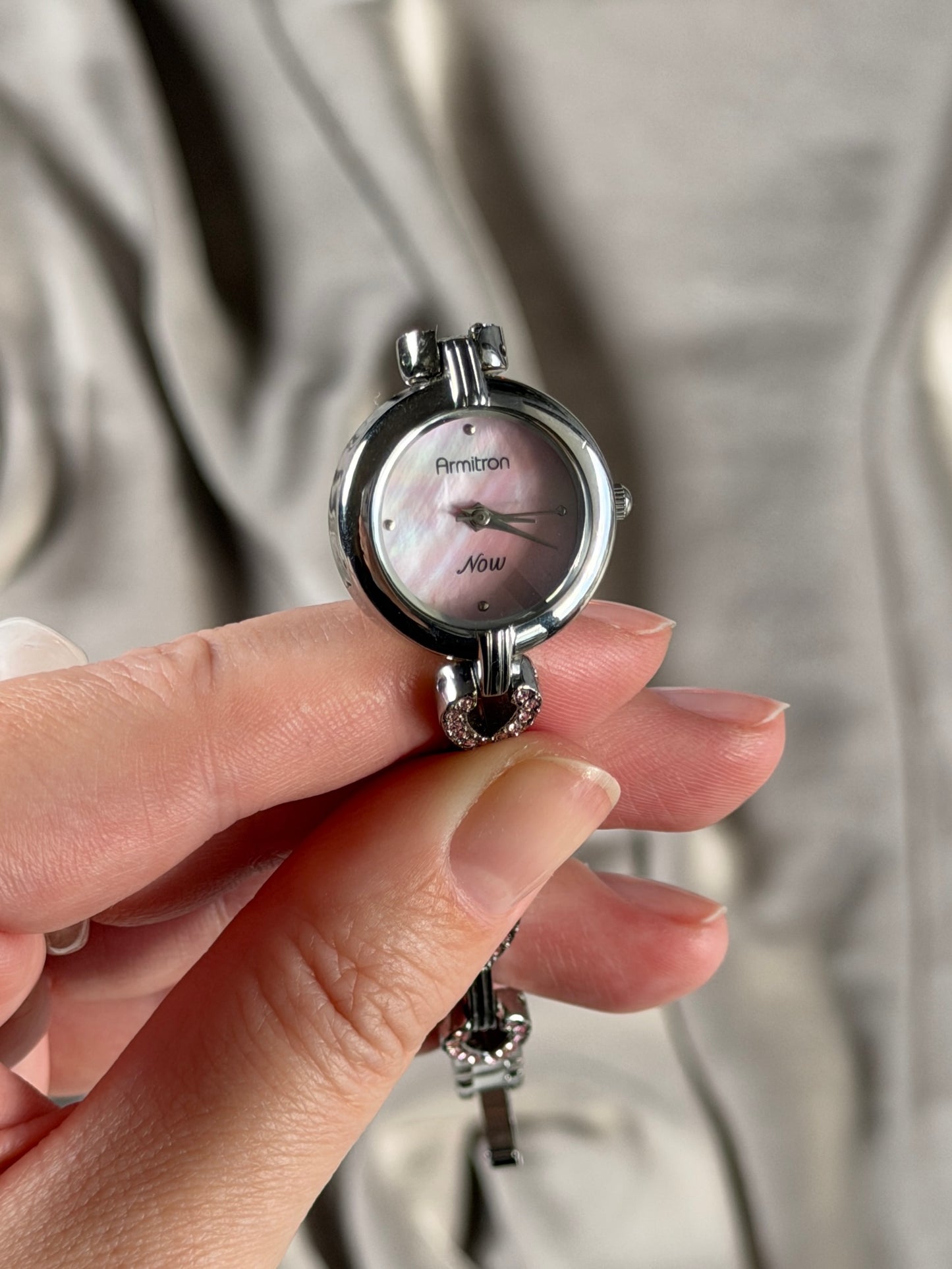 Charming vintage Armitron watch with heart links