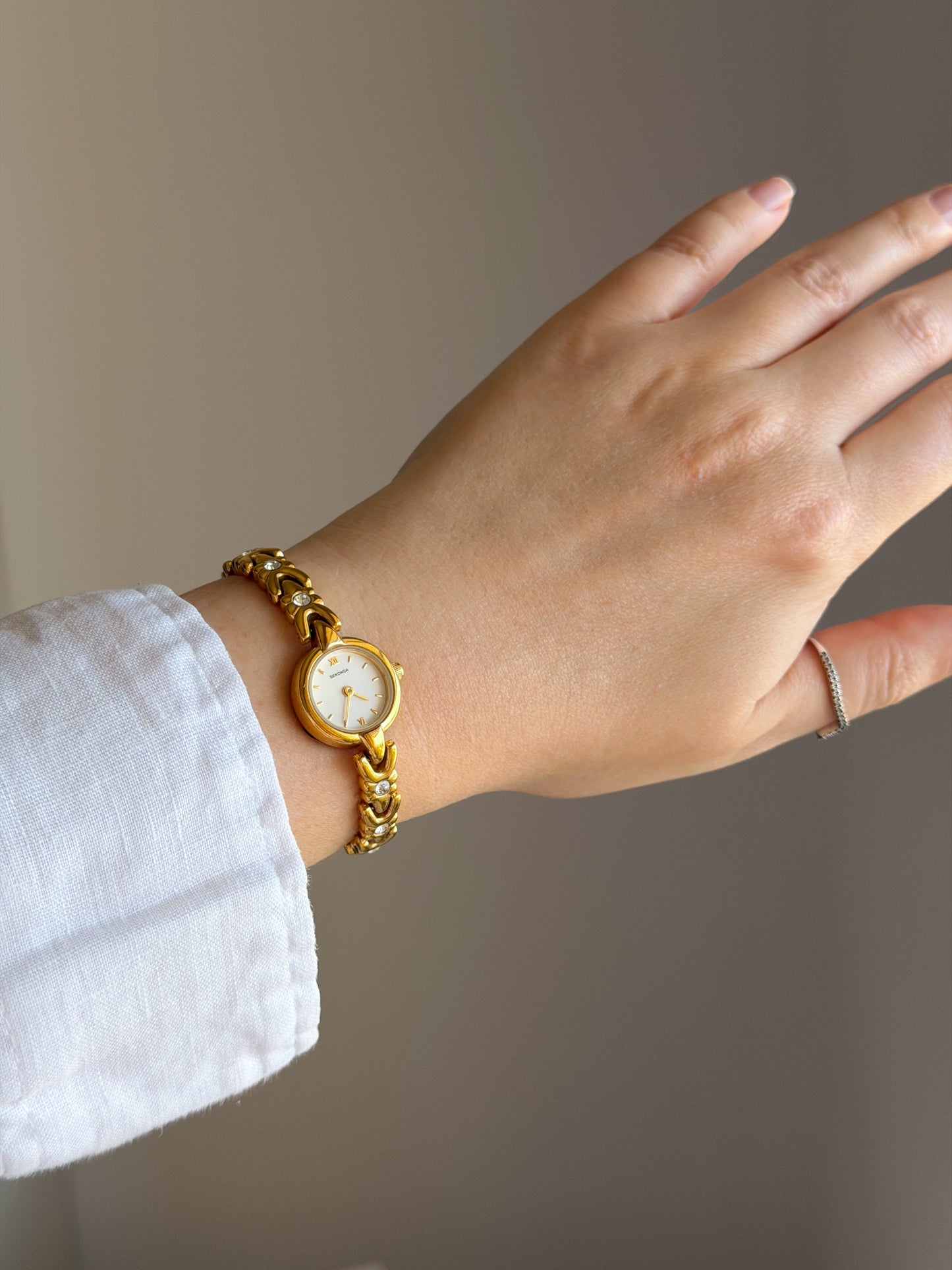 Vintage Sekonda gold-tone watch with crystals