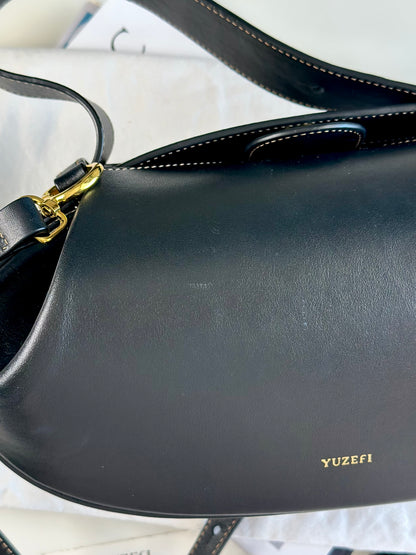 Stunning Yuzefi Loaf Bag crafted from black leather