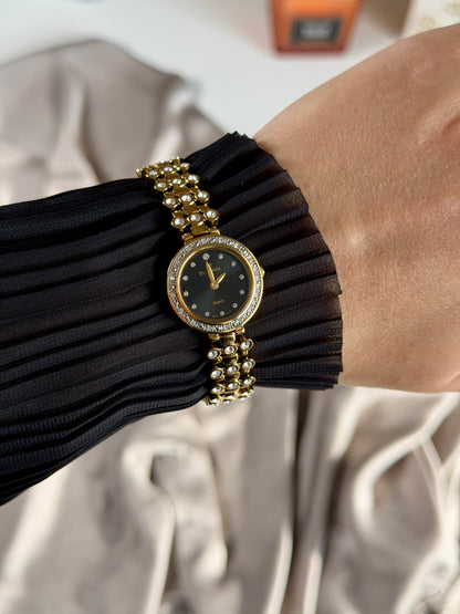 Elegant vintage gold-tone watch EverSwiss with black dial