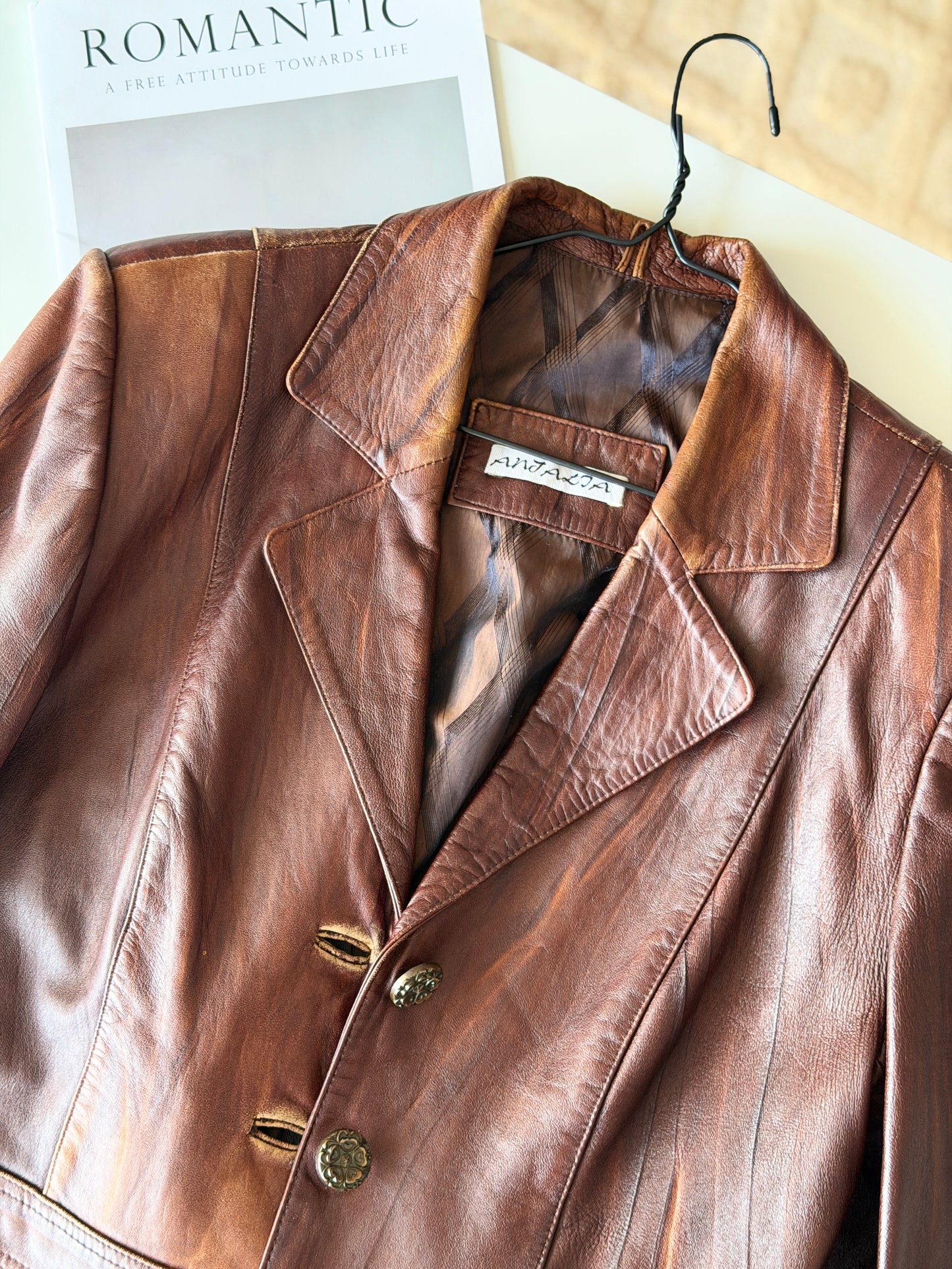Vintage distressed leather jacket in rich brown tone