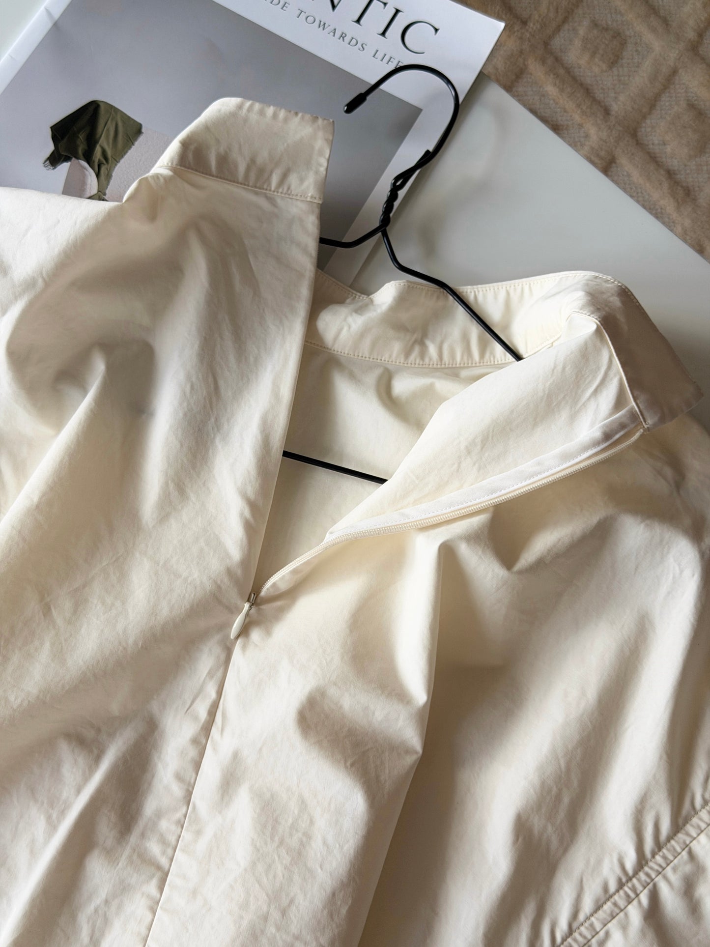 Minimalist cotton top in a soft cream shade