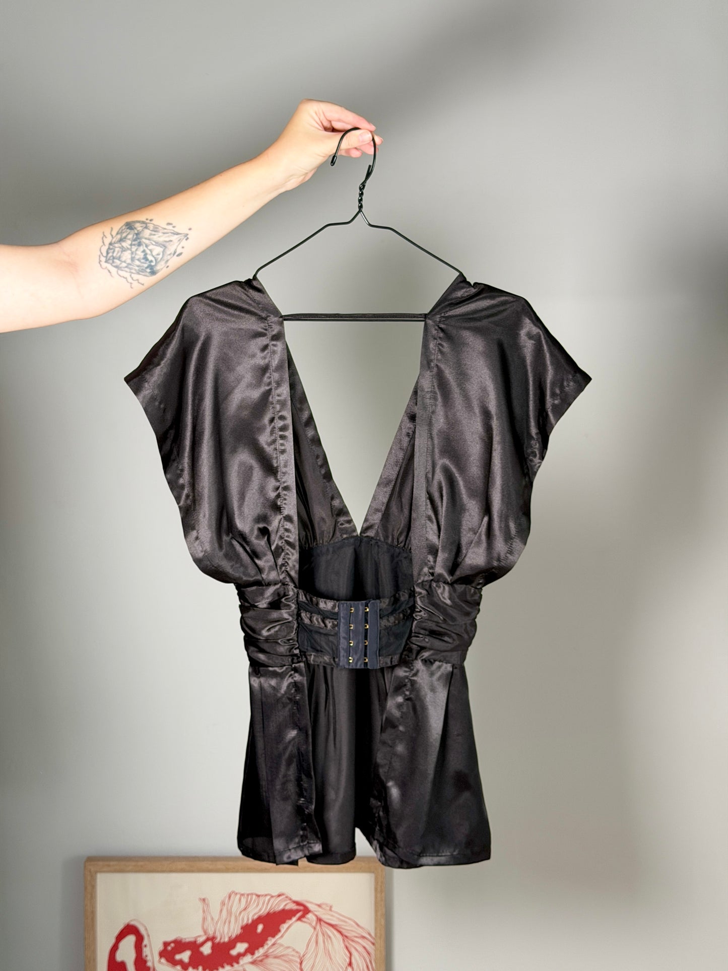 Striking black satin lingerie top
