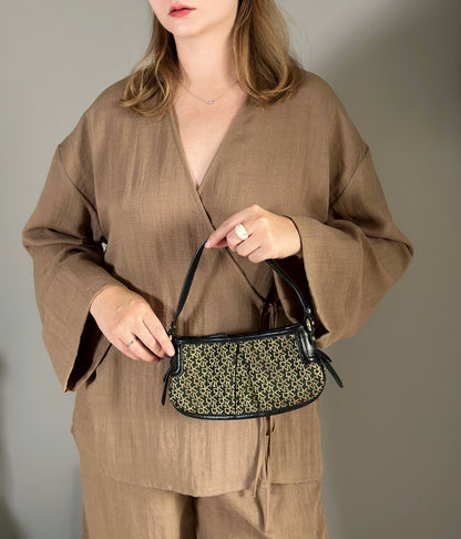 Chic vintage DKNY bag in black and gold