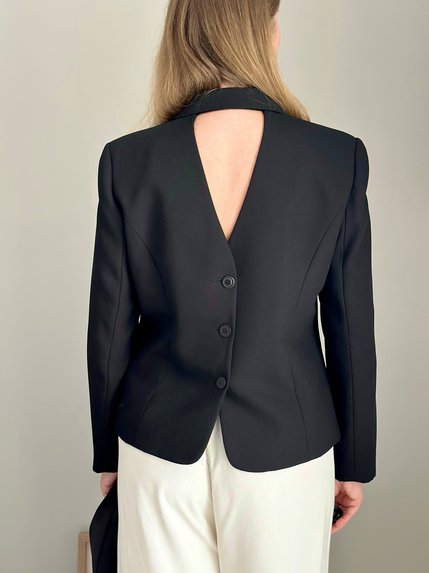 Striking vintage black blazer with open back