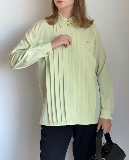 Beautiful vintage blouse in a pastel light green colour