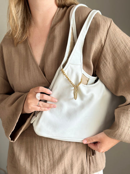 Stylish Coccinelle bag in soft white leather