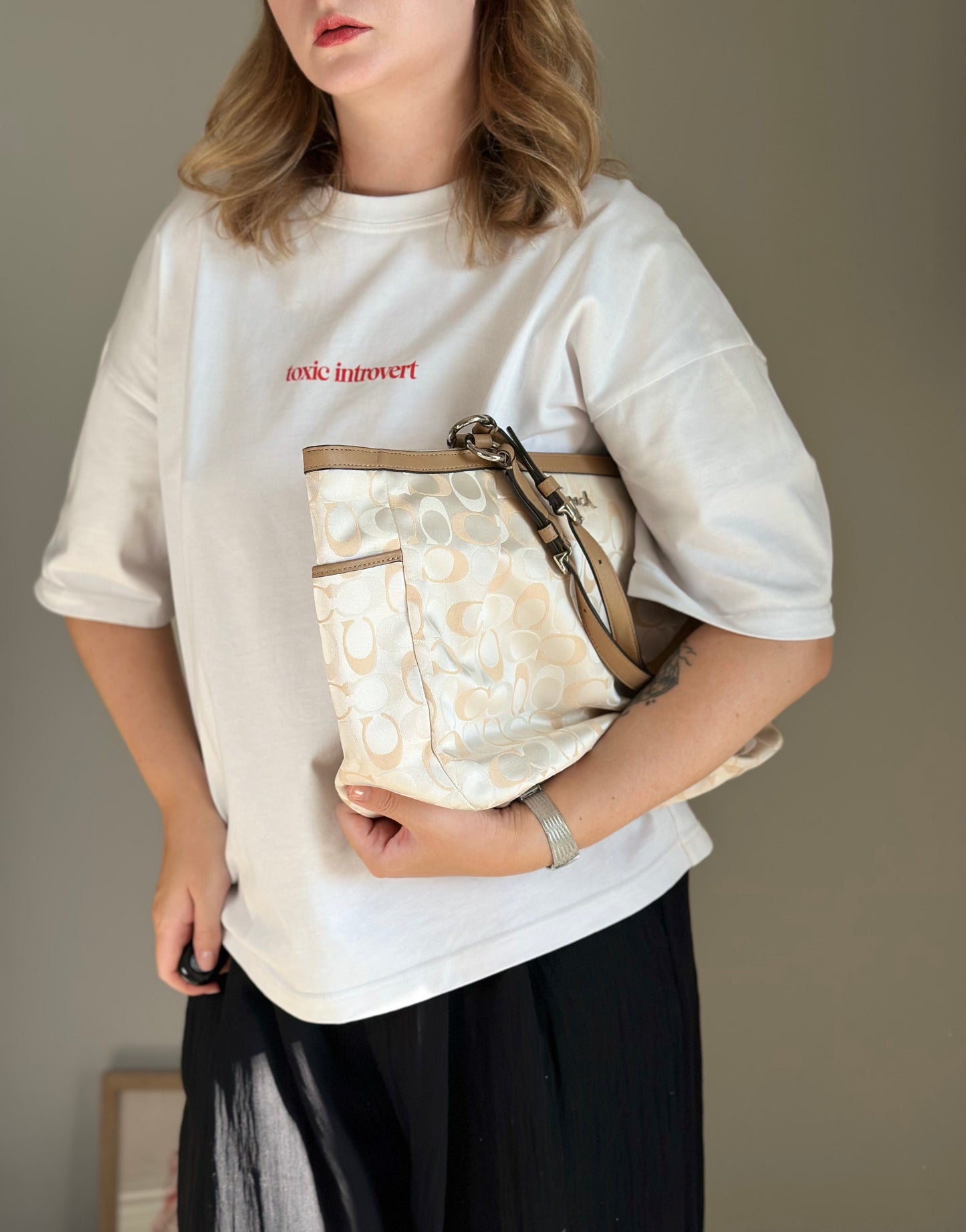 Coach tote bag with iconic “C” monogram