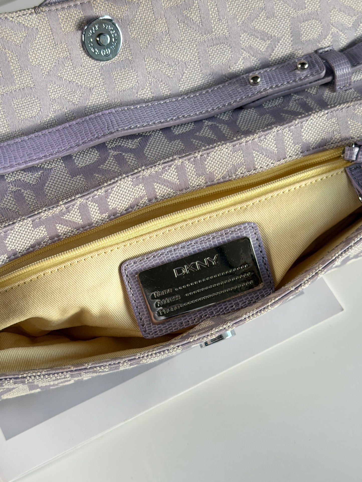 Charming vintage DKNY baguette bag in lilac colour