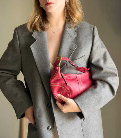 Iconic vintage Coach Soho bag in vibrant fuchsia leather