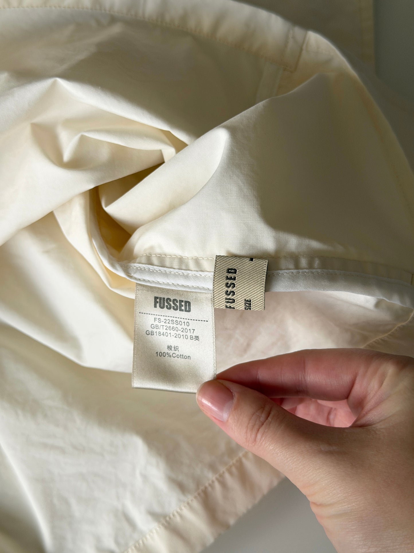 Minimalist cotton top in a soft cream shade