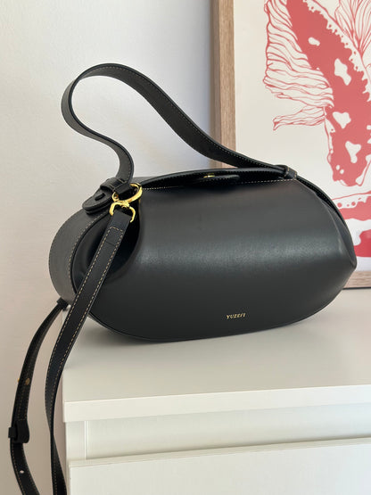 Stunning Yuzefi Loaf Bag crafted from black leather