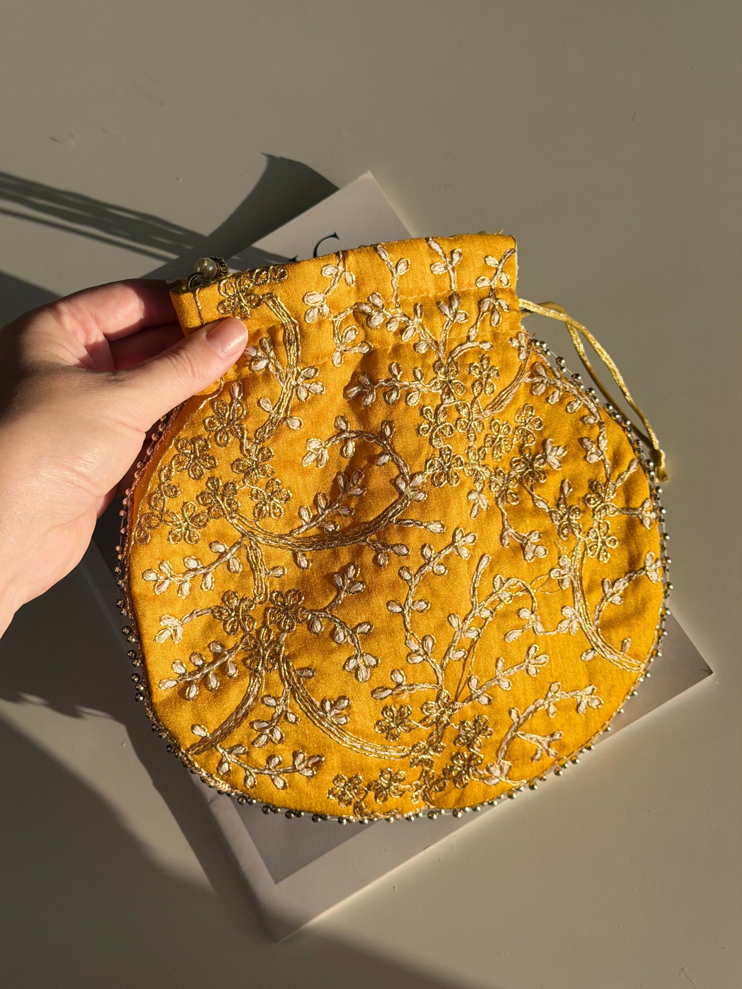 Charming vintage drawstring yellow bag